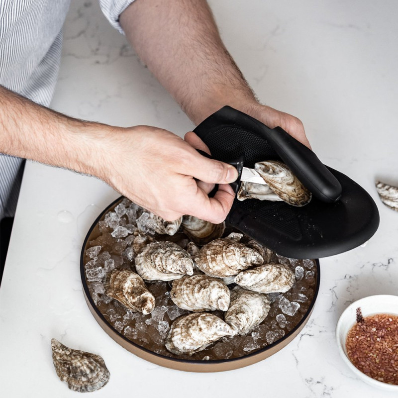 Moufle de protection pour gaucher pour ouverture des huîtres